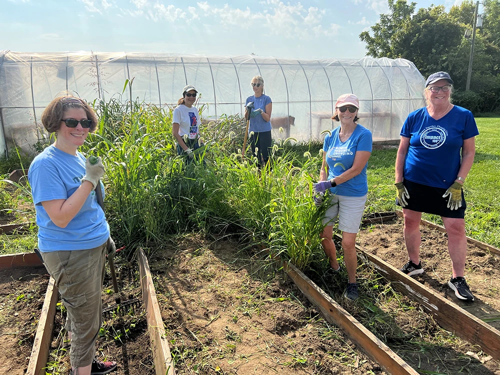 members-working-in-garden.webp